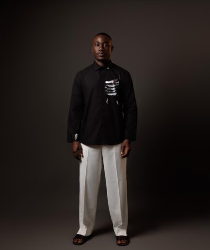 Black Shirt with Abstract Fabric Paint & Off-White Loose-Fit Pants