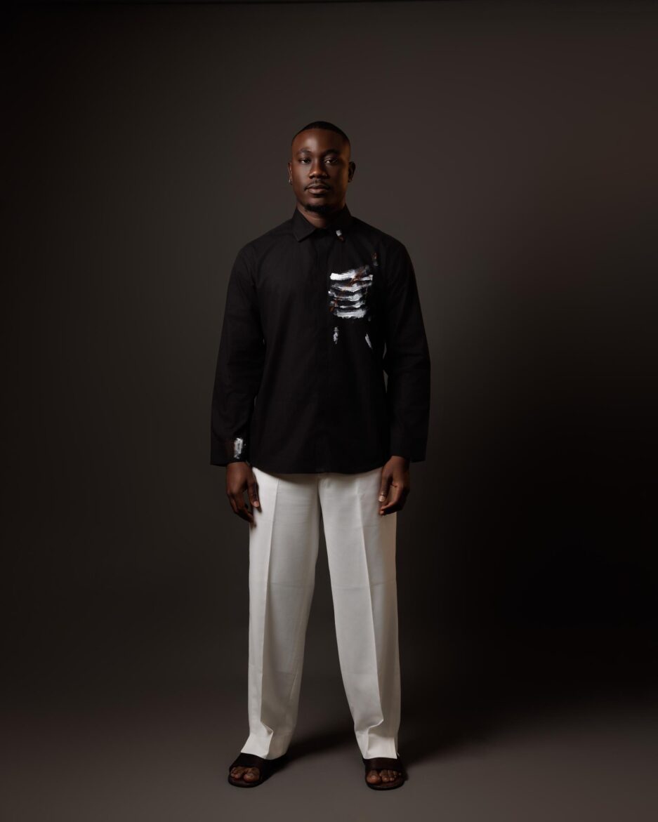 Black Shirt with Abstract Fabric Paint & Off-White Loose-Fit Pants